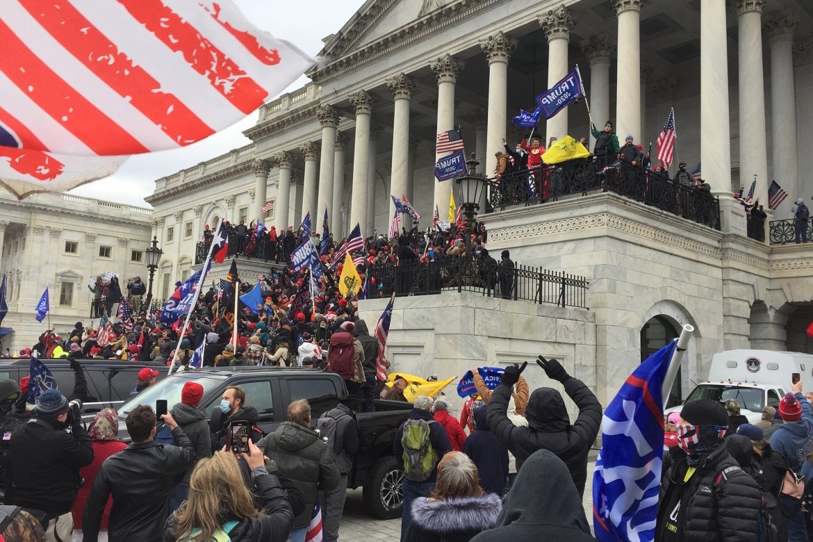 Group storming the DC Capitol on January 6.