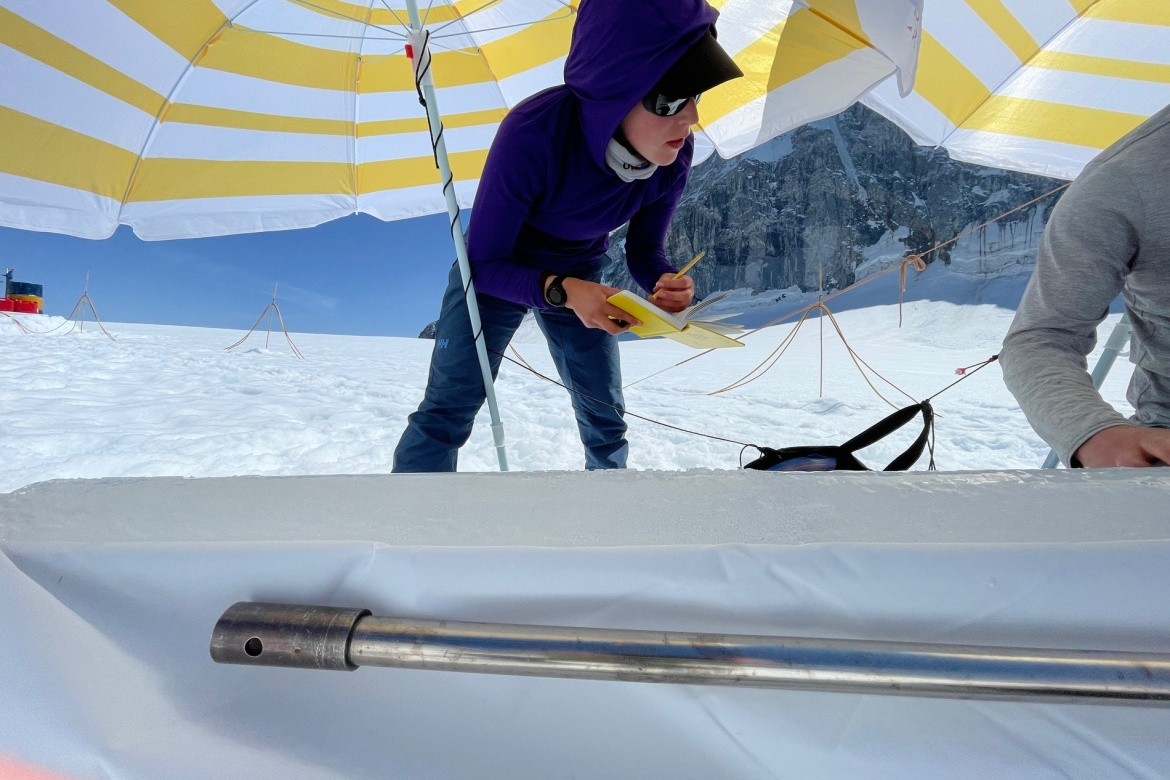 Bridget Hall ’24 taking notes on core processing.