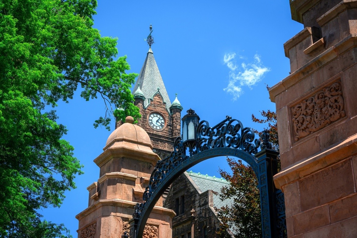 Campus beauty shot of Mount Holyoke's clocktower and gate. Taken in the summer of 2024 by Max Wilhelm.