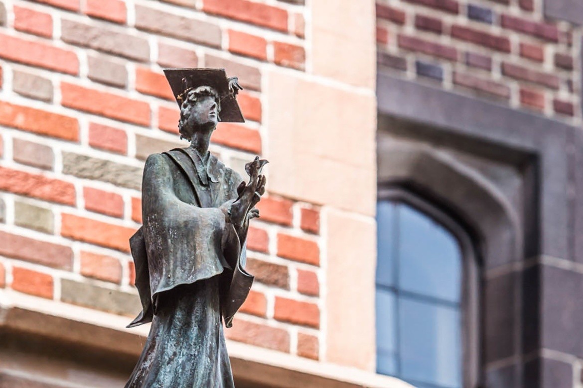 Statue on Mount Holyoke campus of a female scholar