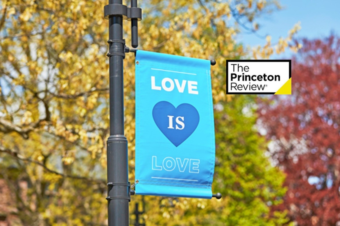 Banner for “Love is Love” on Mount Holyoke College’s campus with the Princeton Review logo in the lower right hand corner