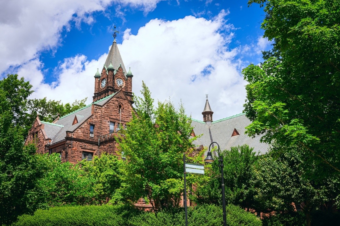 Clocktower in the Mary Lyon building on Mount Holyoke College's campus. Photo taken by Max Wilhelm, summer 2024.