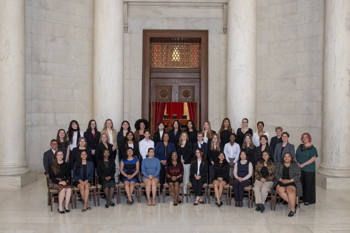 Supreme Court Justice Ketanji Brown Jackson (seated, center) with Mount Holyoke College students, faculty, staff and President Danielle Holley.