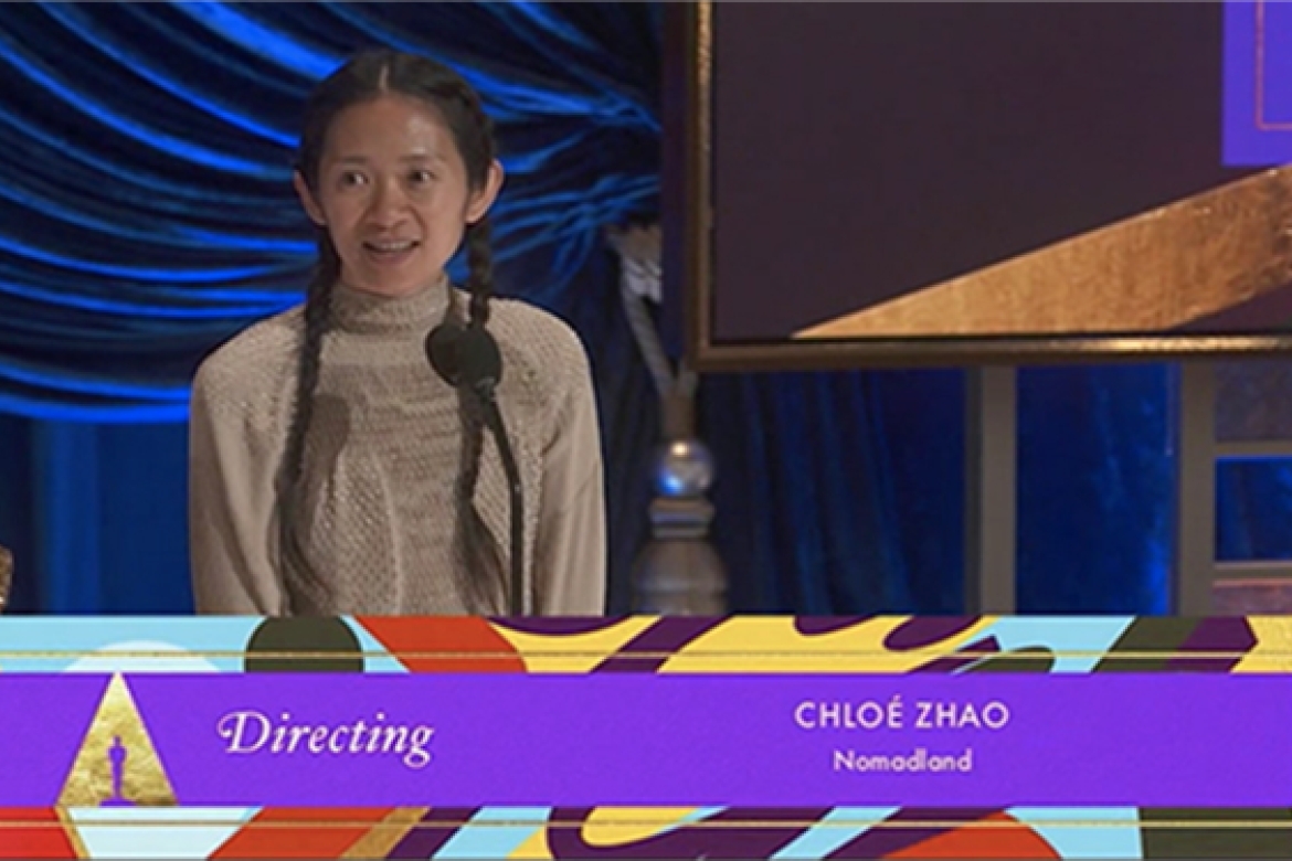 Chloé Zhao ’05 accepting her Academy Award for “Best Director.” 