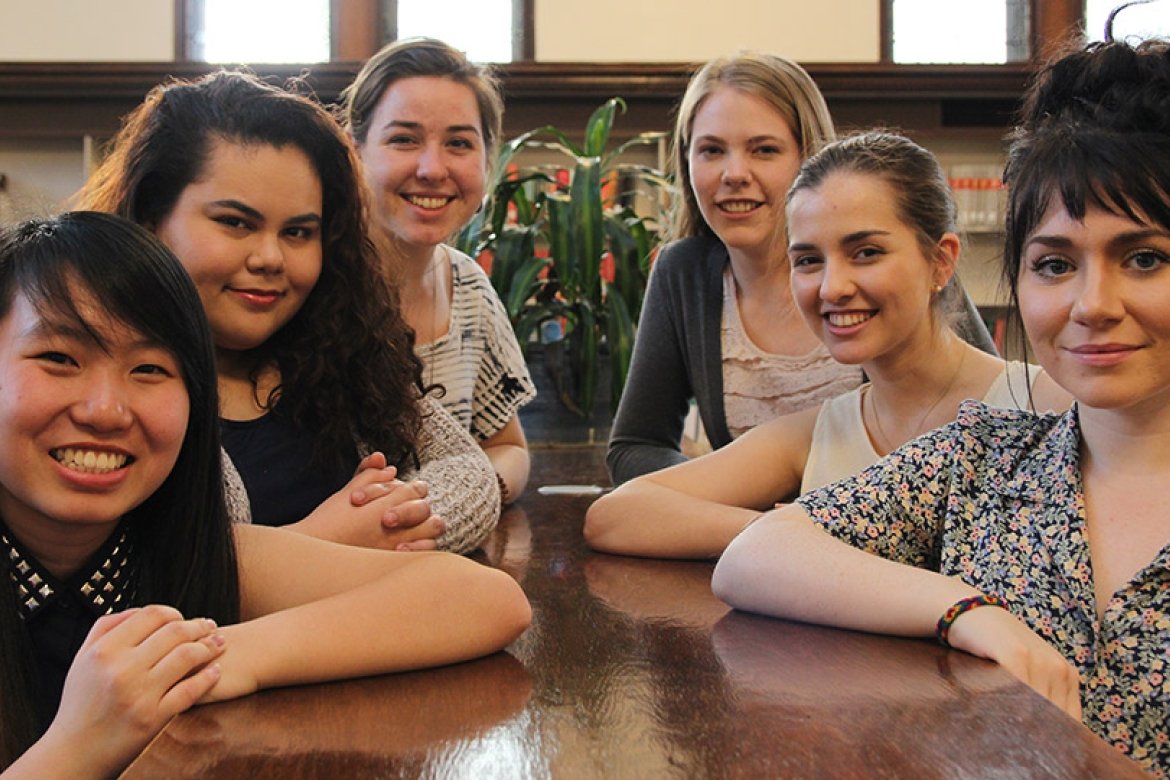 Winners of recent Critical Language Scholarships gather in the library. Photo by John Martins