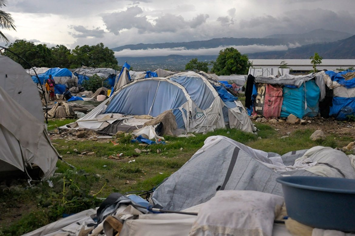 Haitians continue to struggle after disasters such as the 2010 earthquake and the tropical storm that destroyed this tent camp in 2012. Photo: REUTERS/Swoan Parker 