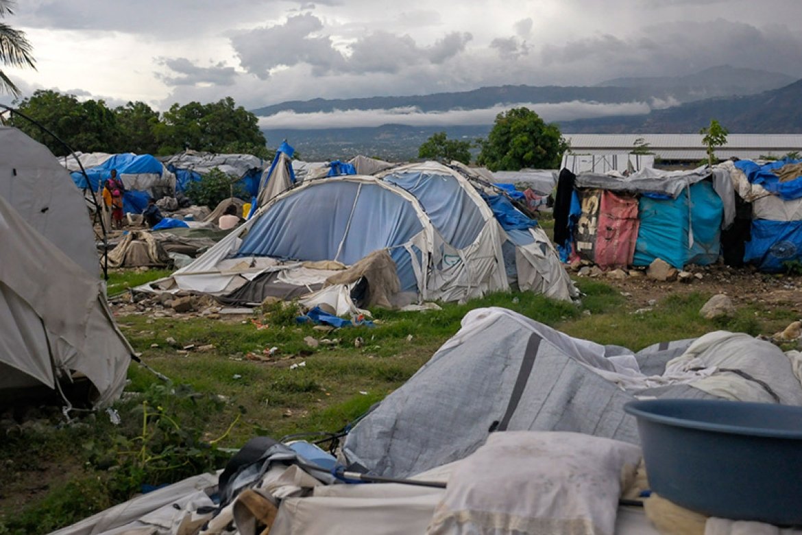 Haitians continue to struggle after disasters such as the 2010 earthquake and the tropical storm that destroyed this tent camp in 2012. Photo: REUTERS/Swoan Parker