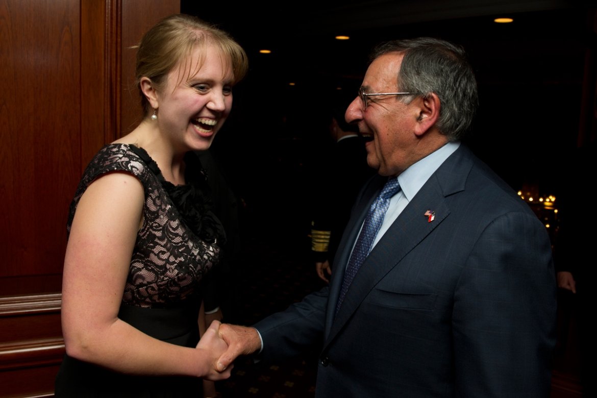 Jessie Babcock '03 with Secretary of Defense, Leon Panetta in 2012.