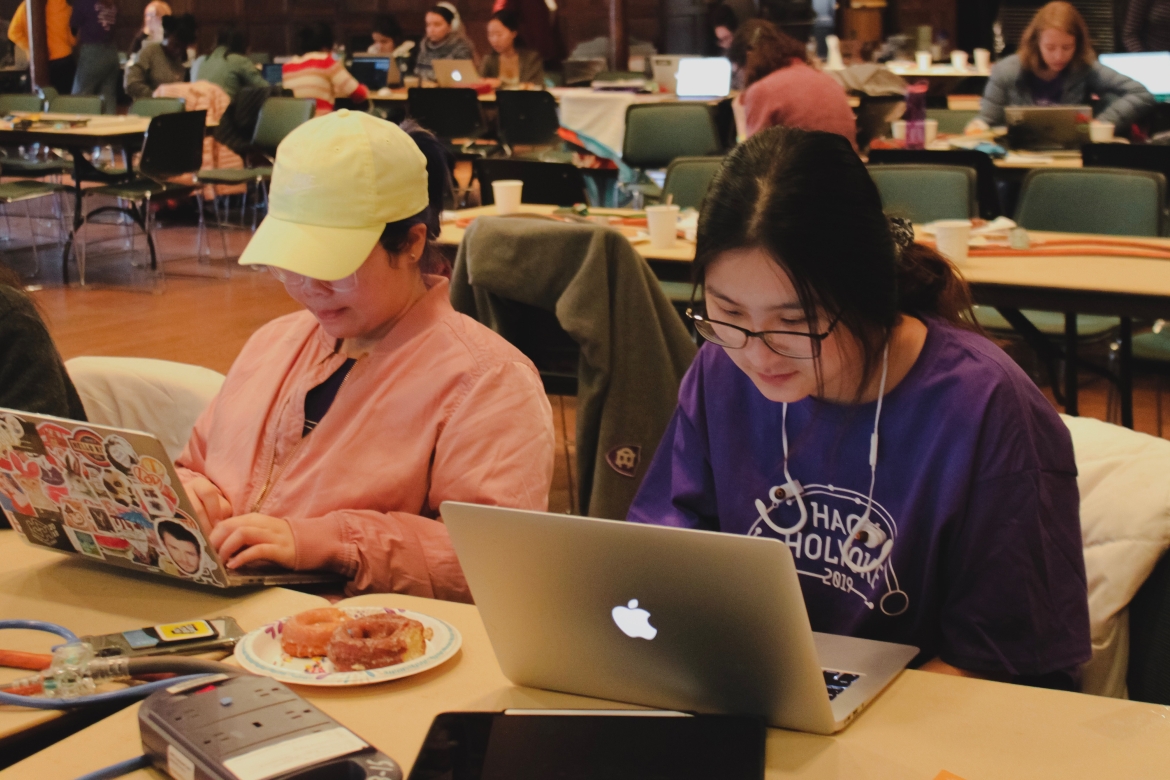 HackHolyoke 2019: Kiki Wang ’21 (left) and Wenyun Wang ’20 working on their game about the periodic table of elements. All photos taken by Reese Hirota ’22.