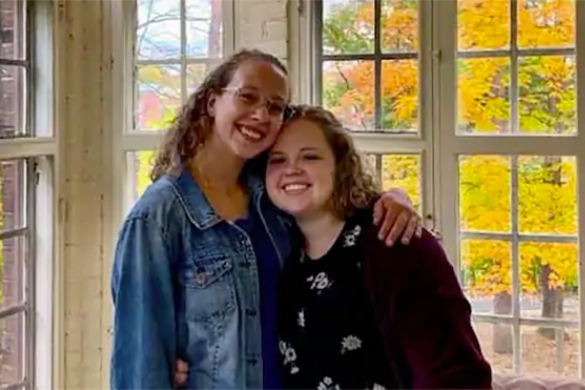 Lily Reavis ’21 (left), hugs her girlfriend, Maggie Micklo ’21, on the Mount Holyoke College campus in 2019. Courtesy Erin Micklo. 