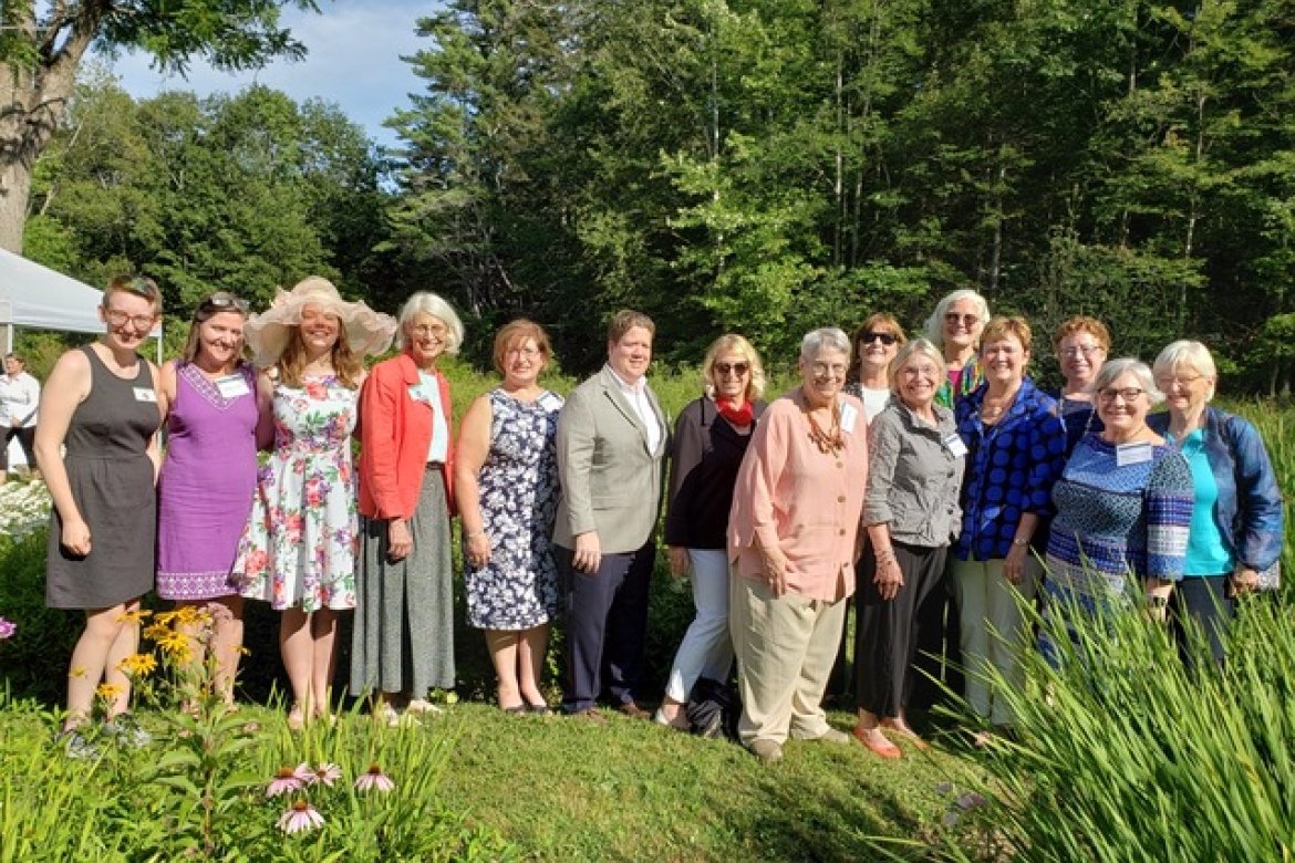 Mount Holyoke alumnae celebrate Maria Mossaides ’73, second from the right, at the Frances Perkins Center 11th annual Garden Party. 