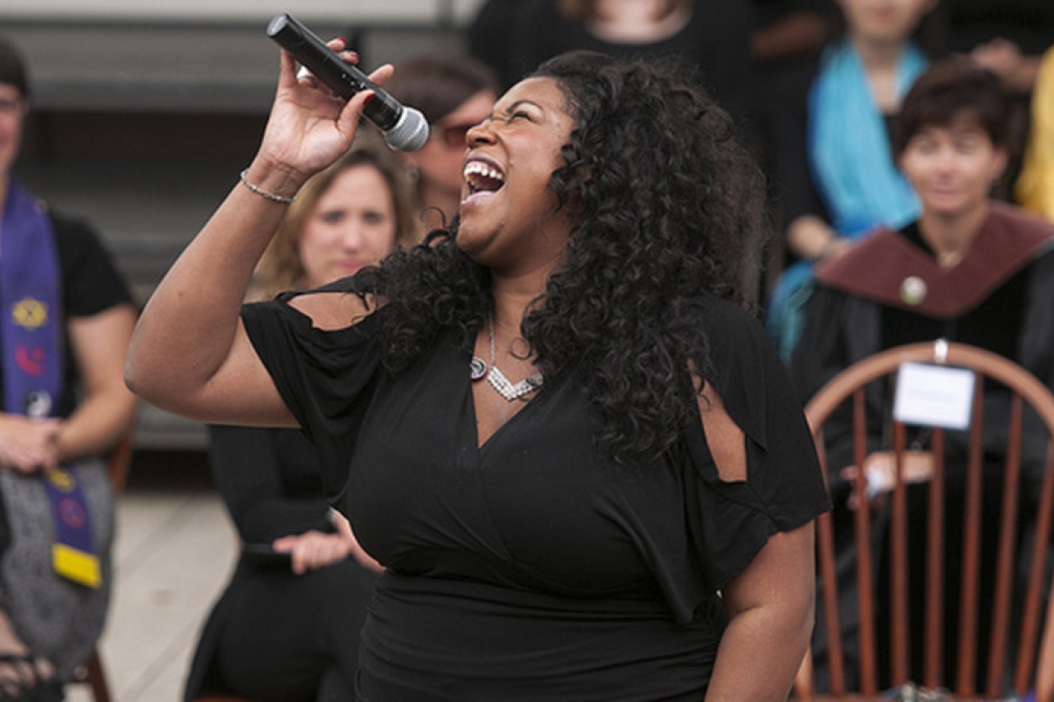 Michelle Brooks-Thompson ’06 wows the crowd at Mount Holyoke’s 2013 convocation. Photo by Ben Barnhart