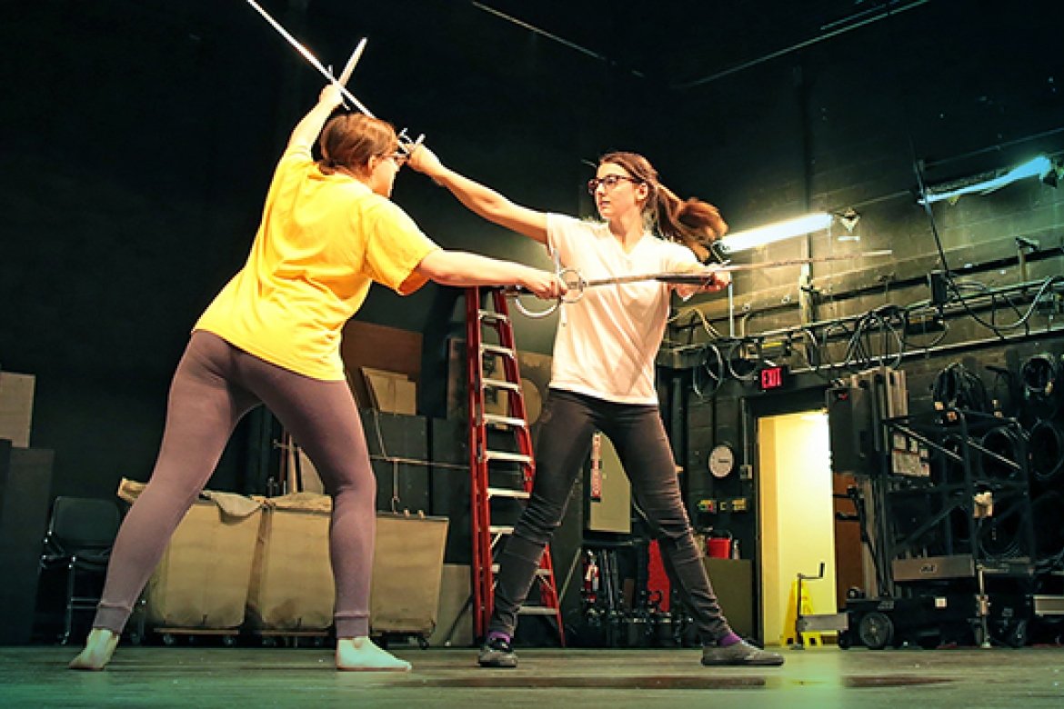 "Turn around, hellhound!" Rochelle Malter ’18 (left) and Maria Signorelli ’17 fight to the death in a scene from "Macbeth."