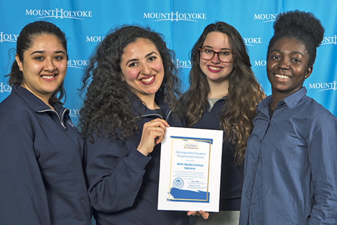 Board members of the Mount Holyoke Model United Nations pose with their Distinguished Student Organization Award citation (from left): Maham Khan ’19, Marwa Mikati ’17, Kim Foreiter ’19 and Edith Amoafoa-Smart ’19.