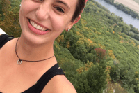 Isabel DiBiasio-Hudson atop Mount Holyoke on Mountain Day