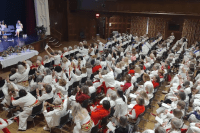 Alums seated in Chapin Auditorium for the annual meeting at Mount Holyoke College.