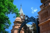 Campus beauty shot of Mount Holyoke's clocktower and gate. Taken in the summer of 2024 by Max Wilhelm.
