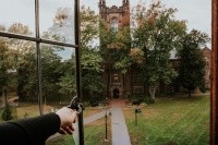 An open window displays an image of the campus library.