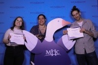 Sarah Garijo-Garde, Nashalie Vazquez and Tim Dietrick pose with their awards and Jorge at Cheers for Peers 2024.
