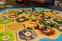 A game of Settlers of Catan. Courtesy of Yongho Kim via Wikimedia Commons.