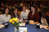 Students enjoying dinner at the Leadership and Service Awards in 2024