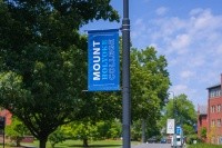 Mount Holyoke banner on the flag post. Photo by Max Wilhelm.