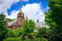 Clocktower in the Mary Lyon building on Mount Holyoke College's campus. Photo taken by Max Wilhelm, summer 2024.