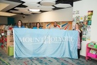 Julie Doyle-Madrid ’98, Principal Chavis Mitchell, President Danielle R. Holley and Executive Director of the Alumnae Association Trisha Tanner ’00. Image courtesy of Meredith Symonds.