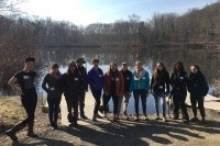 Student, staff and U.S. Fish &amp; Wildlife volunteers pose on the day of Springfield Renaissance high school’s annual field trip to Mount Holyoke.