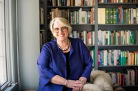 Sonya Stephens standing in front of a bookcase