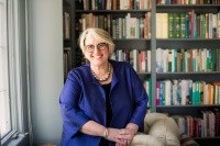 Sonya Stephens standing in front of a bookcase
