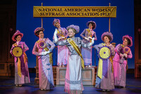 The cast of Suffs on stage in production.