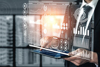 A person holds a tablet, a holographic display in front of them.