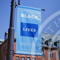 A &quot;Black Lives Matter&quot; banner on a lamp post at MHC.