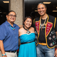 Zowie Banteah ’95 (center) with her family and Larry Spotted Crow Mann (far right).