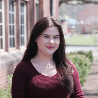 Klara Grygo ’23 standing outside on the Mount Holyoke College campus