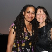 Alumna and playwright Suzan-Lori Parks L) poses with Mount Holyoke senior lecturer Leah Glasser. Parks won the prestigious Steinberg Award, recognizing her artistic contributions to American theater.