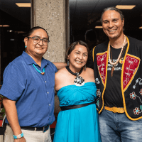 Zowie Banteah ’95 (center) with her family and Larry Spotted Crow Mann (far right).