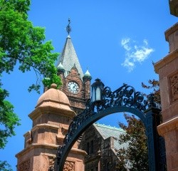 Campus beauty shot of Mount Holyoke's clocktower and gate. Taken in the summer of 2024 by Max Wilhelm.