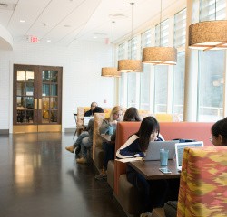 Dine with us at Mount Holyoke College - our dining room with students sitting at the tables
