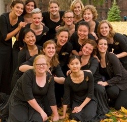 A group of singers in the fall leaves