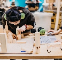A student works on a wood project in the Fimbel Lab