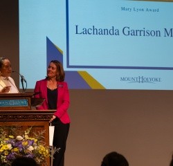 Lachanda Garrison MAT’19 provides words of wisdom to students during the Student Leadership and Service Awards on April 30, 2025. Not pictured: Kate Krueger ’11