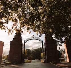 The Gates to MHC at sunset.
