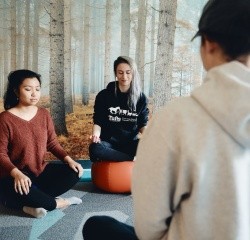 Students meditating in the Moasis space