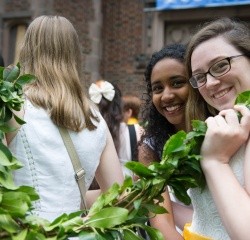Students smiling as they carry the Laurel Chain
