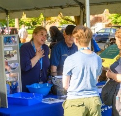 Staff from Public Safety and Service handing out information during new student orientation