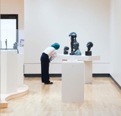 Student with Art Museum Sculptures
