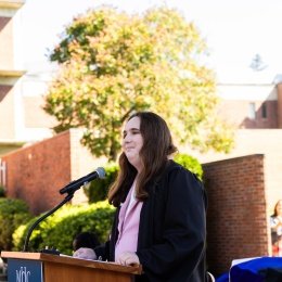 Lily E. Rood ’27 speaking at Convocation in fall 2024. 