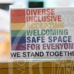 Sign on door that reads "Diverse, Inclusive, Accepting, Welcoming, Safe Space for Everyone, we stand together".